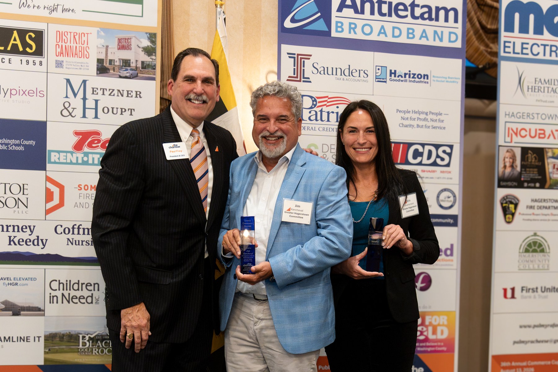 Award recipients standing together on stage