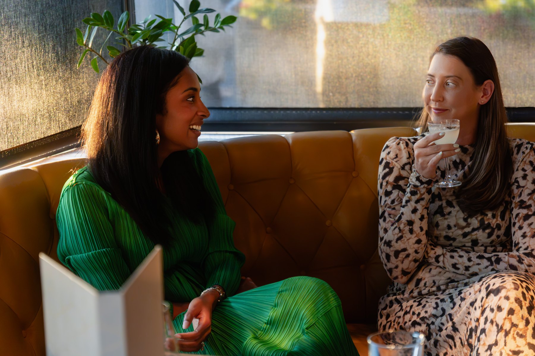 Two guests talking during a birthday celebration in Washington, DC