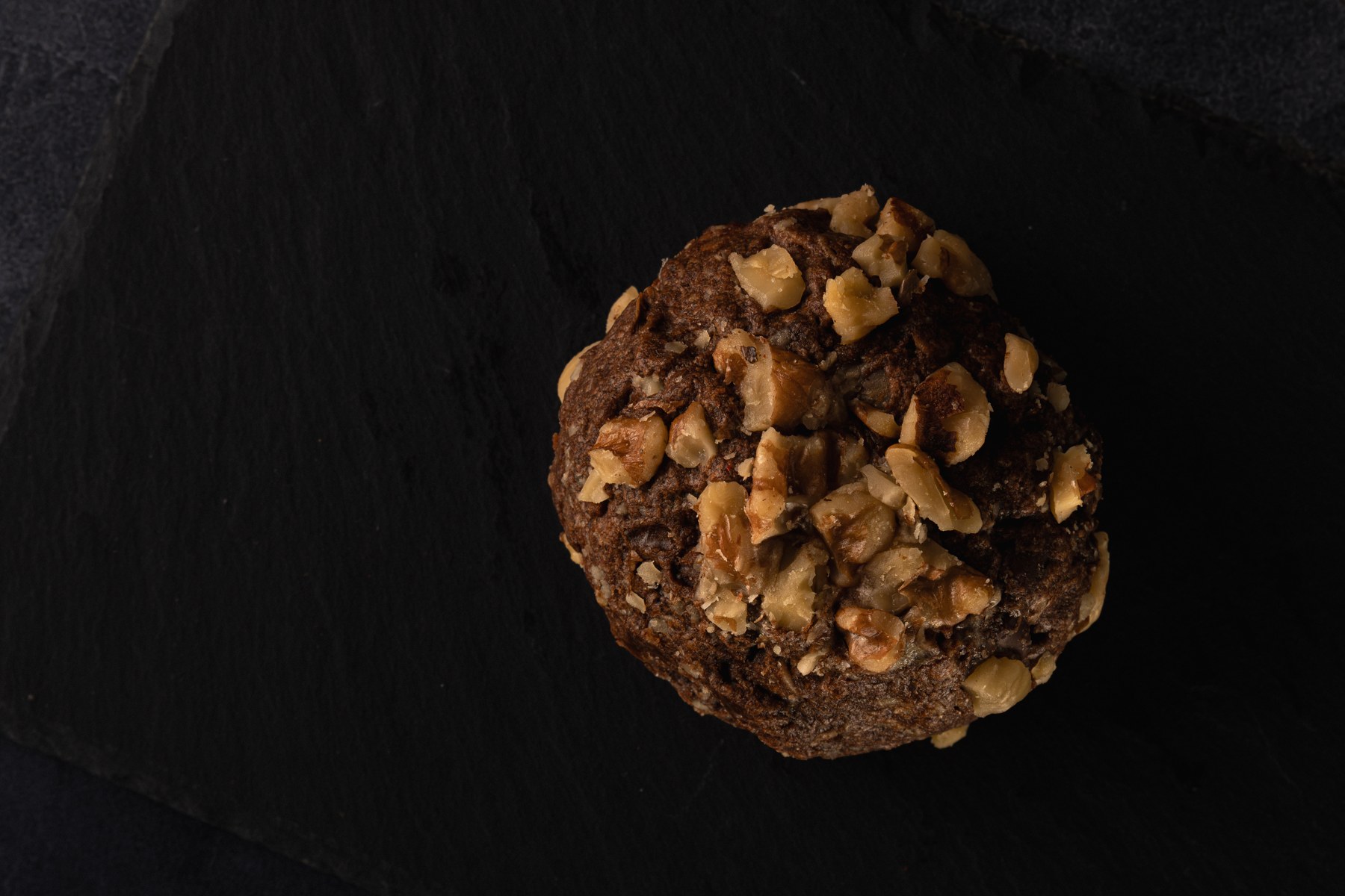 Close-up of the surface and chocolate chips of a cookie